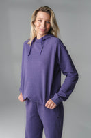 A woman wearing Violet Marl Studio Hoodie