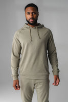 A man wearing Matcha Marl Studio Hoodie