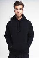 A man wearing Vitality's Maker Hood in Midnight