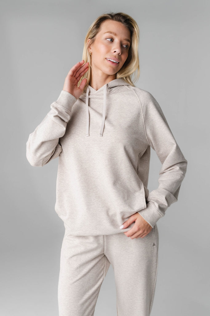 A woman wearing Antler Marl hoodie